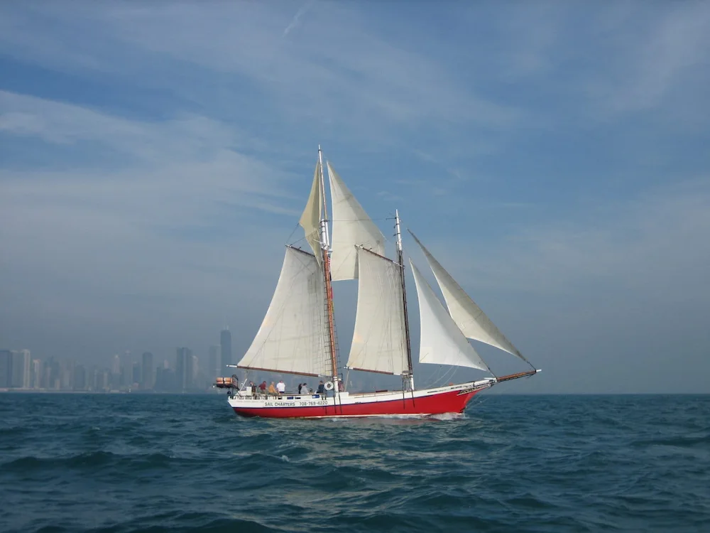 Red schooner sailing boat
